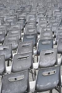 Close-up shot of several chairs in Saint Peter's Square in Vatican City, Italy