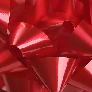 Close-up of big red Christmas bow.
