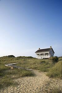 Coastal house with pathway to beach on Bald Head Island, North Carolina.