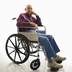 Portrait of Caucasion elderly man sitting in wheelchair.
