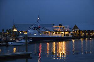 Cruise boat docked at night on Bald Head Island, North Carolina.