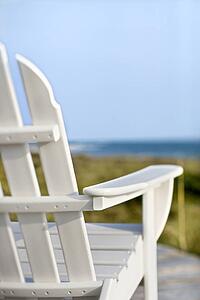 Adirondack chairs on deck looking towards beach on Bald Head Island, North Carolina.