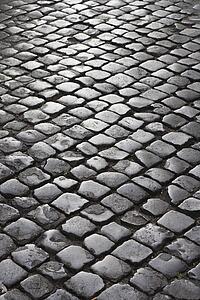 Close-up of cobblestone street in Rome, Italy