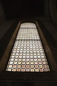 Indoor low angle view of stained glass window.