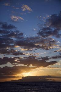 Sunset clouds over the coast of Kihei, Maui, Hawaii, USA.