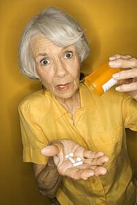 Caucasian mature adult female with medication.