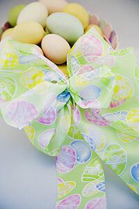 Easter eggs in a basket with bow