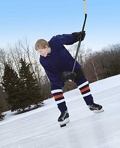 Boy ready for slap shot