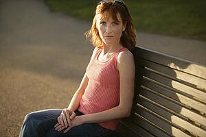 Woman sitting on a bench