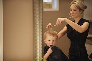 Boy getting a haircut