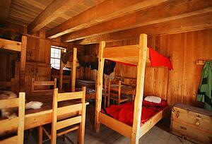 Bunk beds in a rustic interior