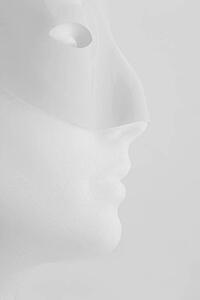 Profile view of mannequin with mask