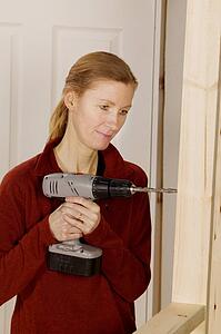 Woman drilling