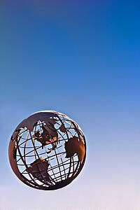 Terrestrial globe on blue background