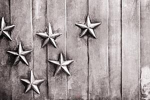 Stars mounted on a vertically lined background