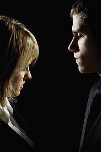 Side profile of a couple looking serious