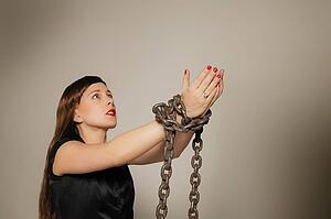 Woman wrapped in a chain