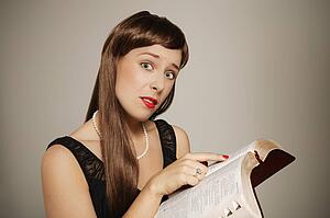 Woman confused while reading