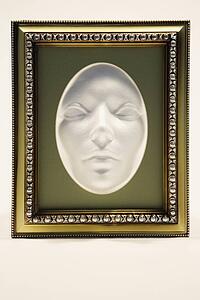 Mask in a picture frame