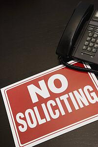 No soliciting sign with a telephone
