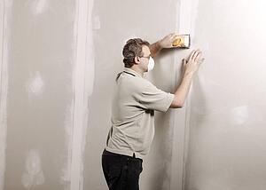 Man using a sander