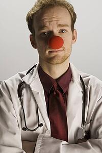 Doctor wearing a clown's nose