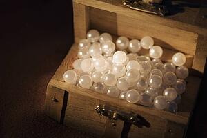 Pearls in a wooden box