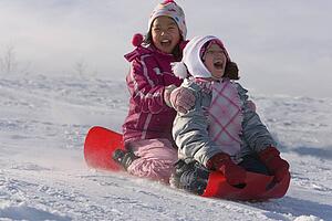 Children tobogganing