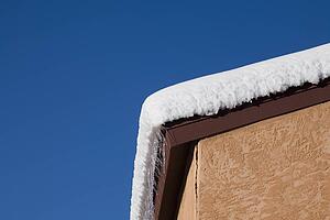 Snow On Rooftop