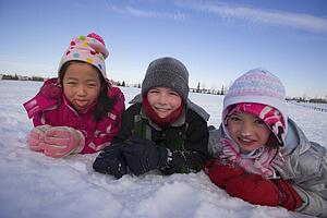 Children playing in the snow