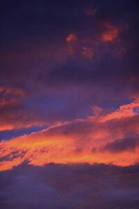 Clouds in sky with pink glow