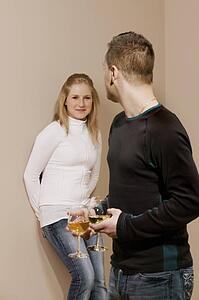 Couple having wine together