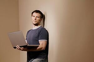 Man holding laptop