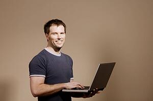 Man holding laptop