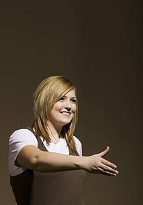 Woman reaching out hand