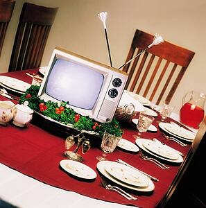 TV on platter on dinner table
