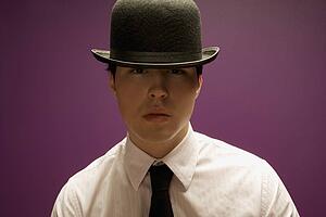 Man wearing a bowler hat