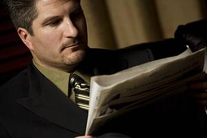 Businessman reading the paper