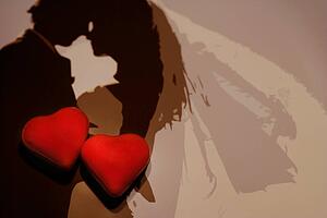 Two hearts on image of wedding couple
