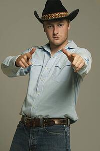 Cowboy pointing with two hands ahead