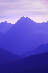 Hazy layered mountain scene 