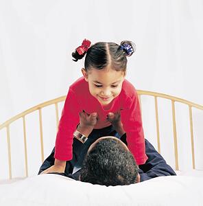 Father and daughter playing