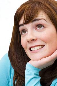 Portrait of woman looking hopeful
