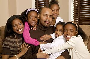 Dad with his daughters