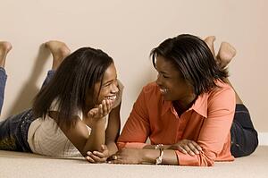 Mom and daughter relaxing together