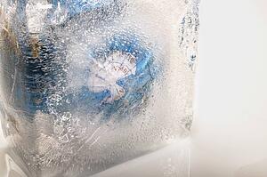 A globe completely covered in an ice block