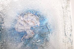 Top of the globe completely covered with ice