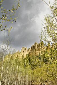 Dutch Creek hoodoos and spring foliage with cloudy sky 