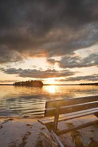 A bench overlooking Astotin Lake at Elk Island National Park, Alberta, Canada 