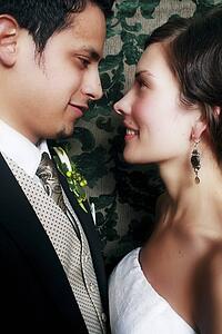 Side view of a couple smiling